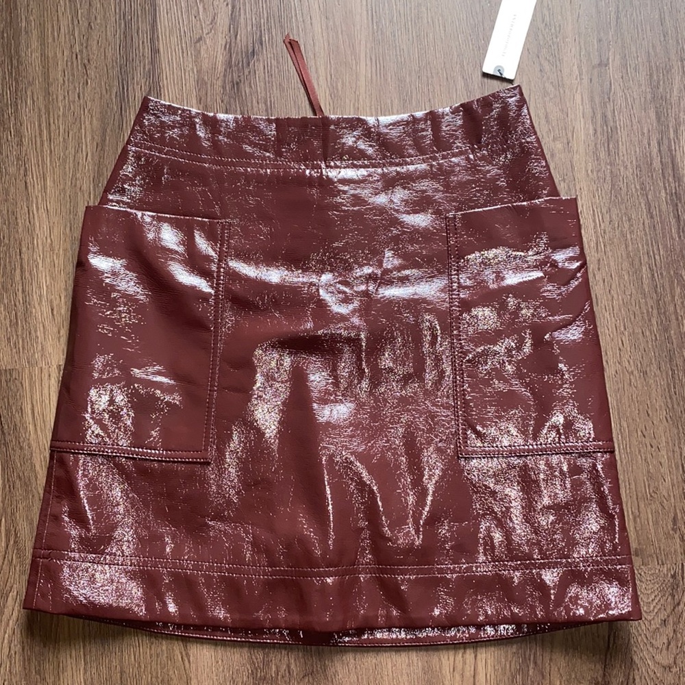 COPY - STILL AVAILABLE. anthropologie patent maroon skirt